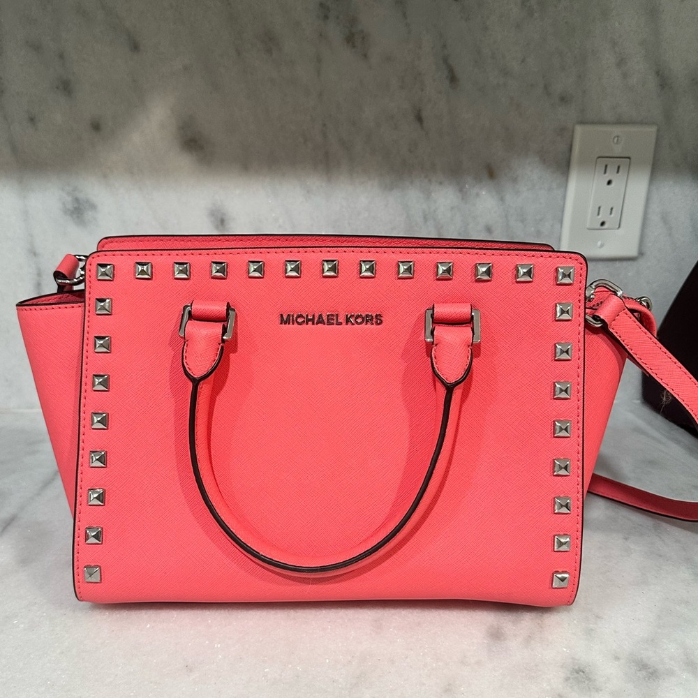 Pink Michael Kors, Crossbody bag. Like new, never used. Cleaning out closet :)